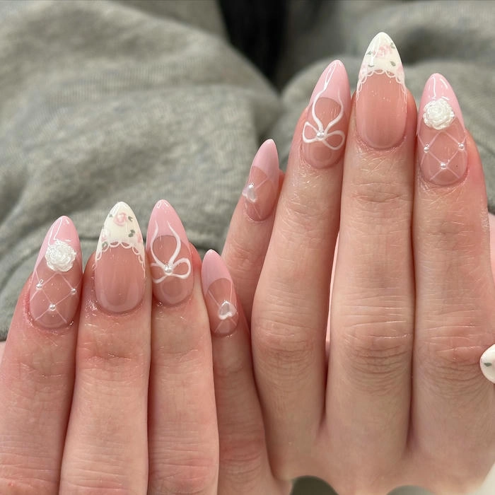 mẫu nail tay vẽ hoa và nơ