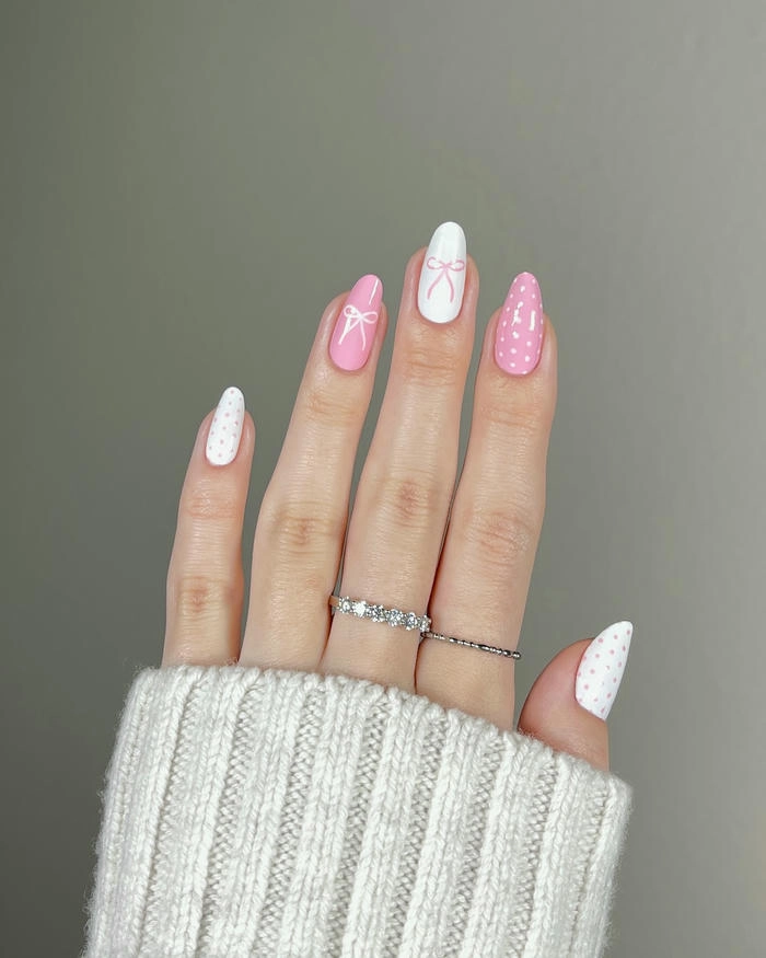nail tay vẽ nơ và chấm bi