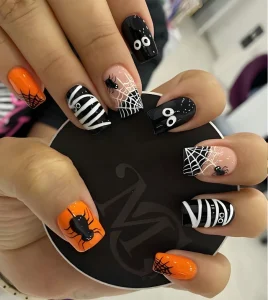 Halloween nail tông cam đen
