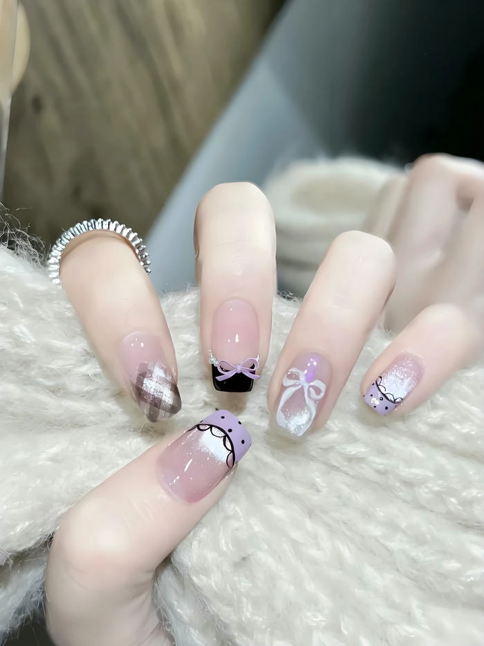 Nail tím pastel có đính nơ