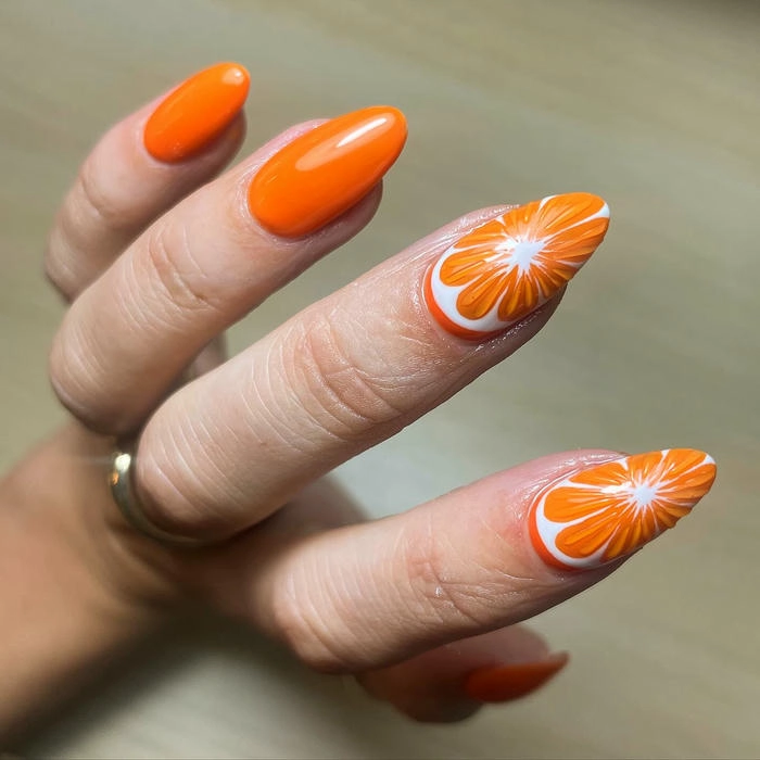 ảnh mẫu nail màu cam