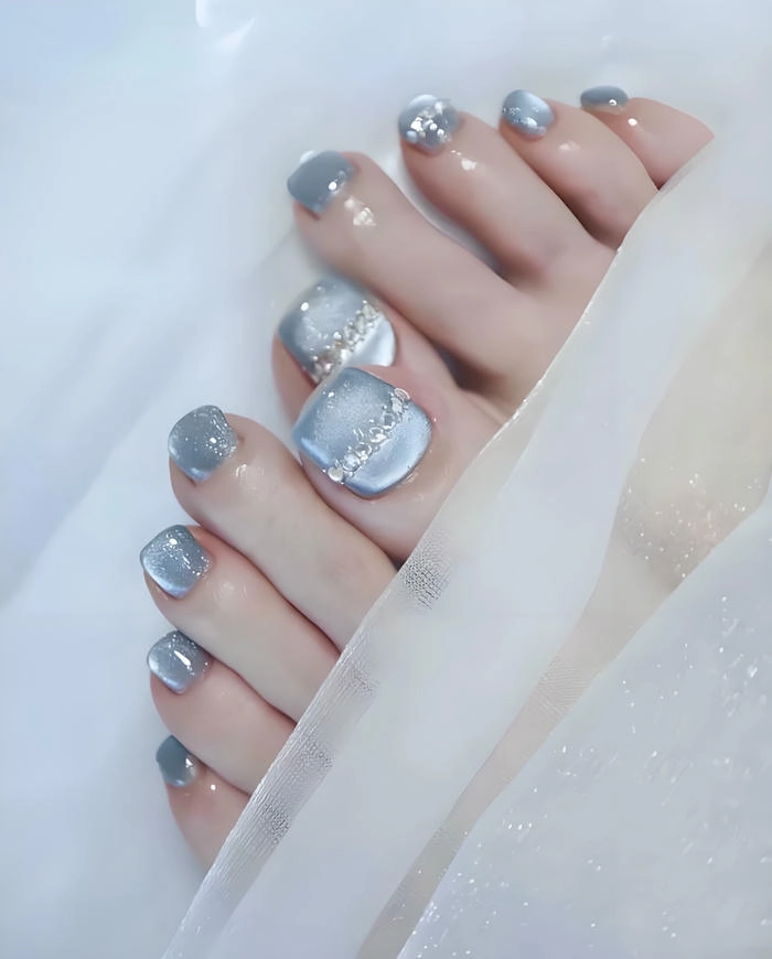 mẫu nail chân sơn thạch màu xanh mắt mèo