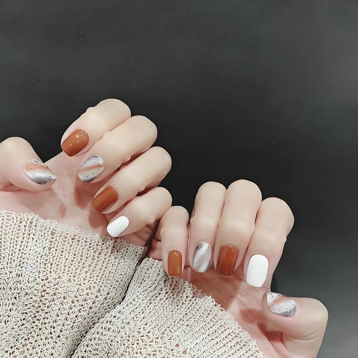 mẫu nail màu cam đất