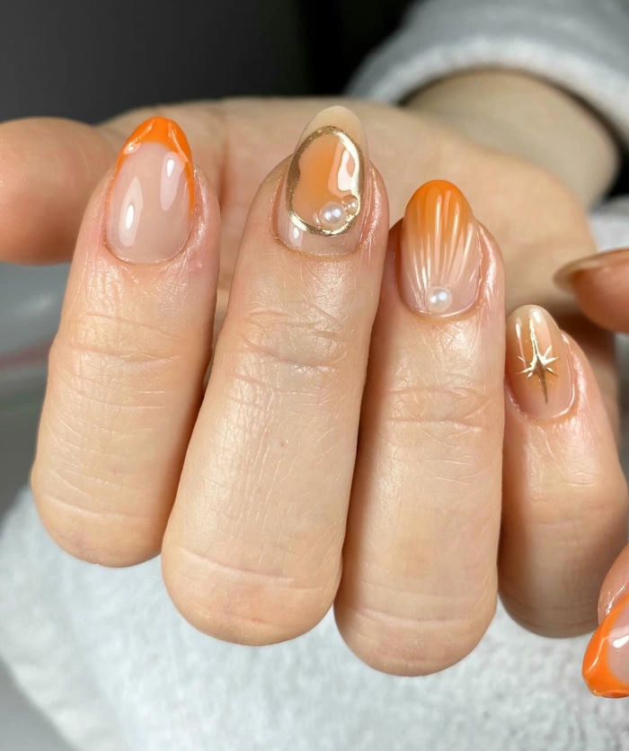mẫu nail màu cam đi biển