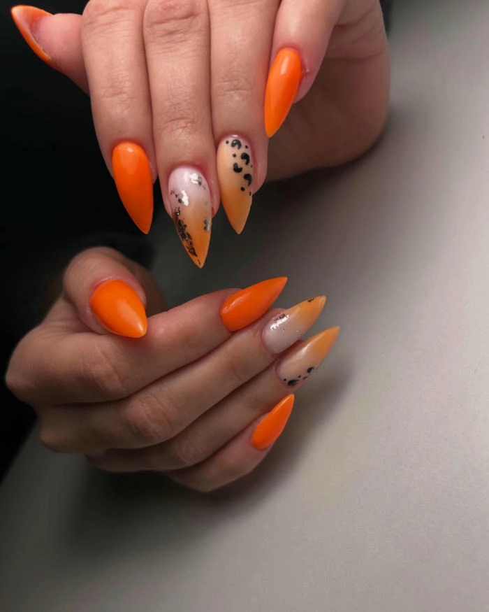 mẫu nail màu cam siêu đẹp móng nhọn