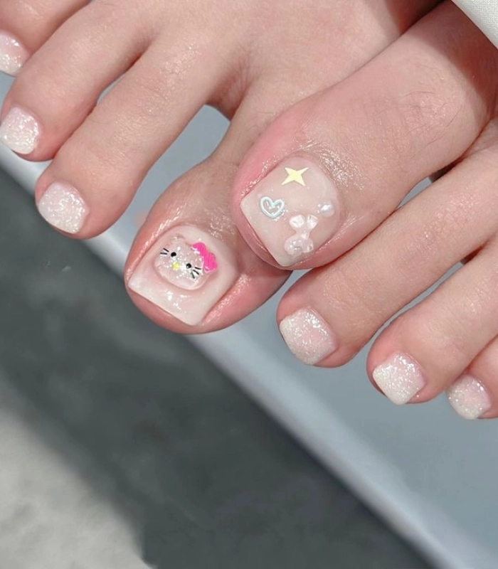 Mẫu nail chân Hello Kitty hồng pastel