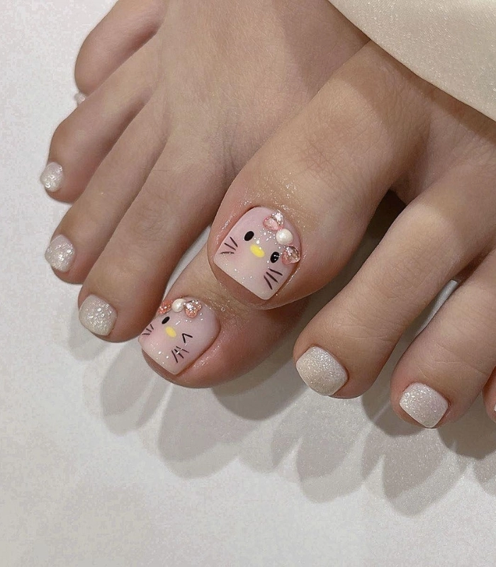 Mẫu nail chân Hello Kitty tone nude