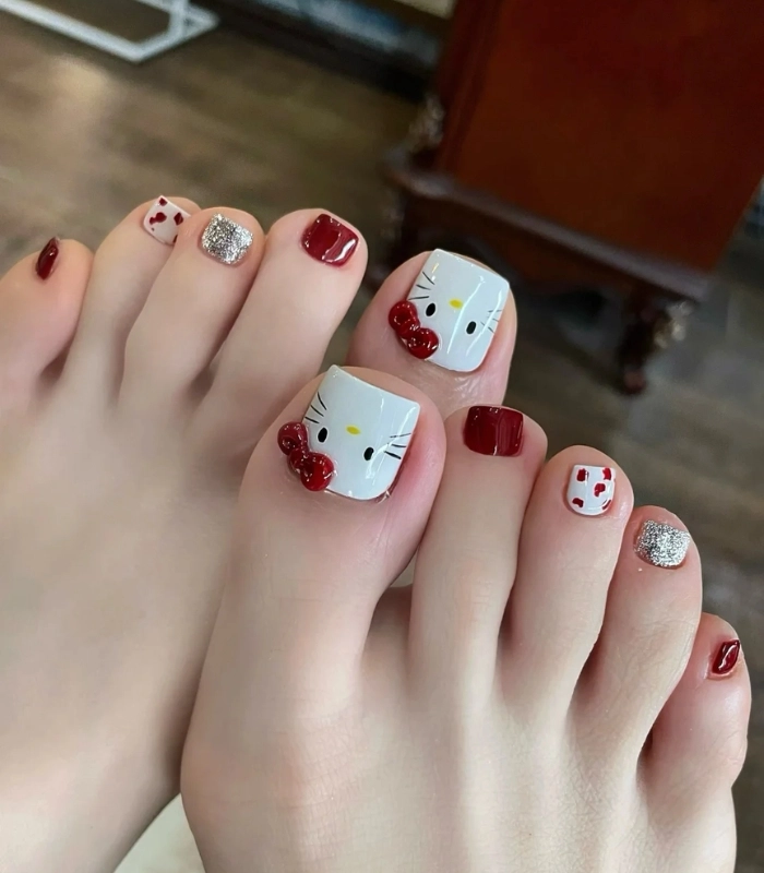 Nail chân Hello Kitty màu đỏ
