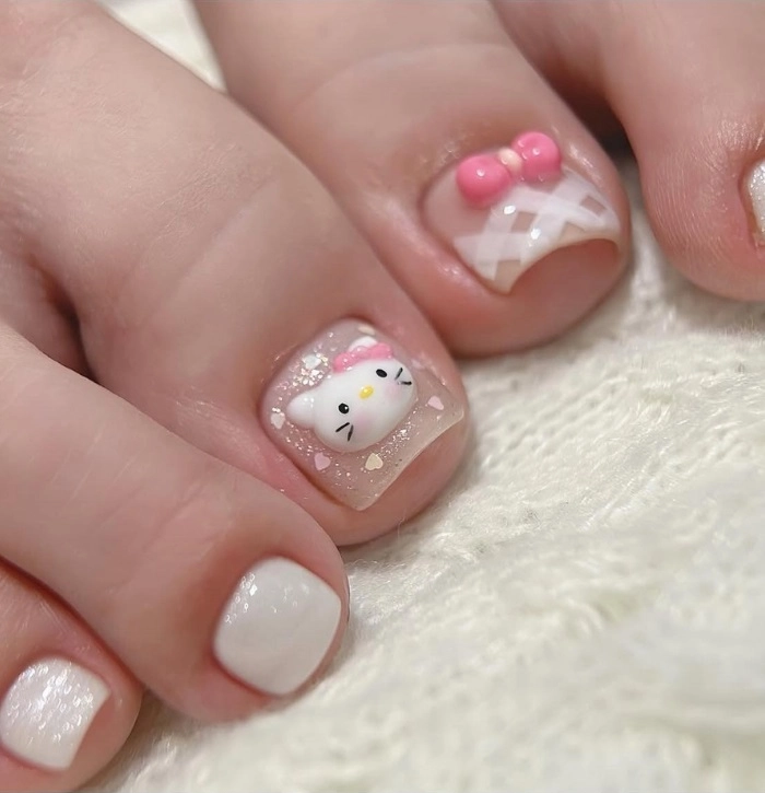 Nail chân Hello Kitty nền hồng