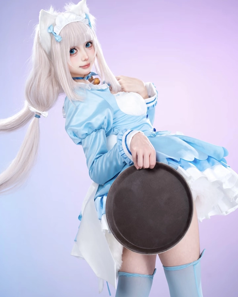 Nữ cosplay mèo xinh xắn với ánh mắt long lanh